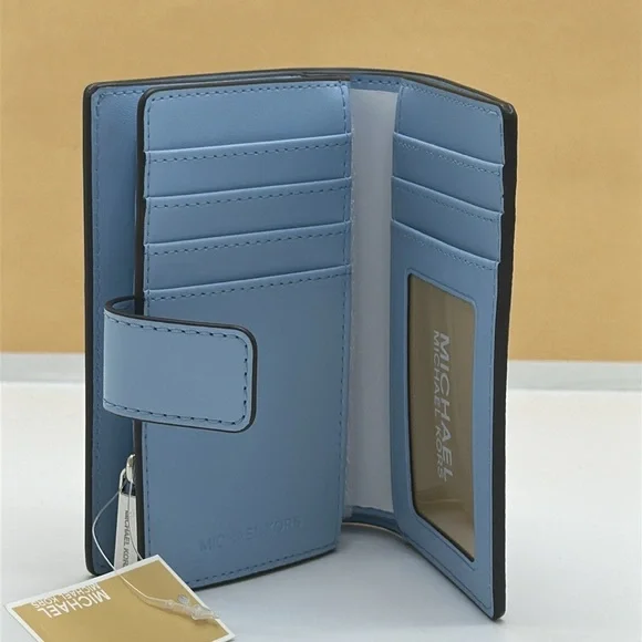 Michael Kors Jet Set Travel Medium Printed Signature Logo Bi-Fold Wallet
LT SKY - Picture 7 of 15